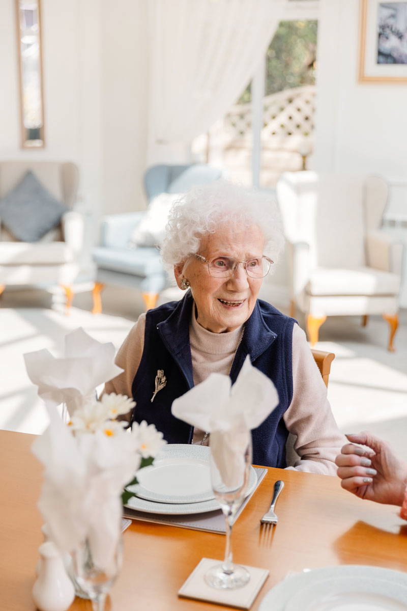 resident of Bolton's residential care home community Starmount Villa enjoys the high quality dining experience